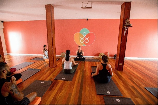 Yoga students seated during integrative yoga training